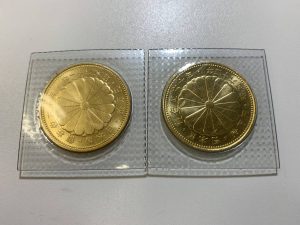 御在位60周年記念10万円金貨